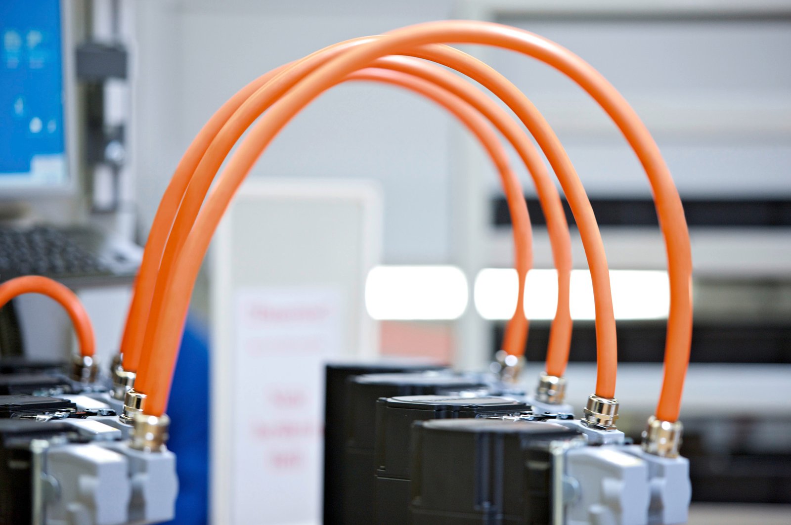 Bosch Rexroth IndraDrive Mi drives connected with orange hybrid cables